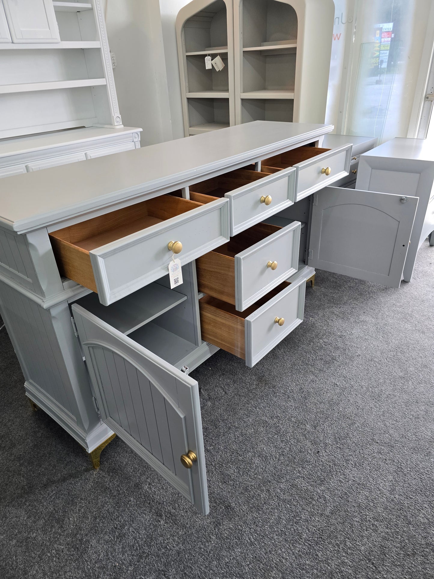 Gray dresser with golden legs