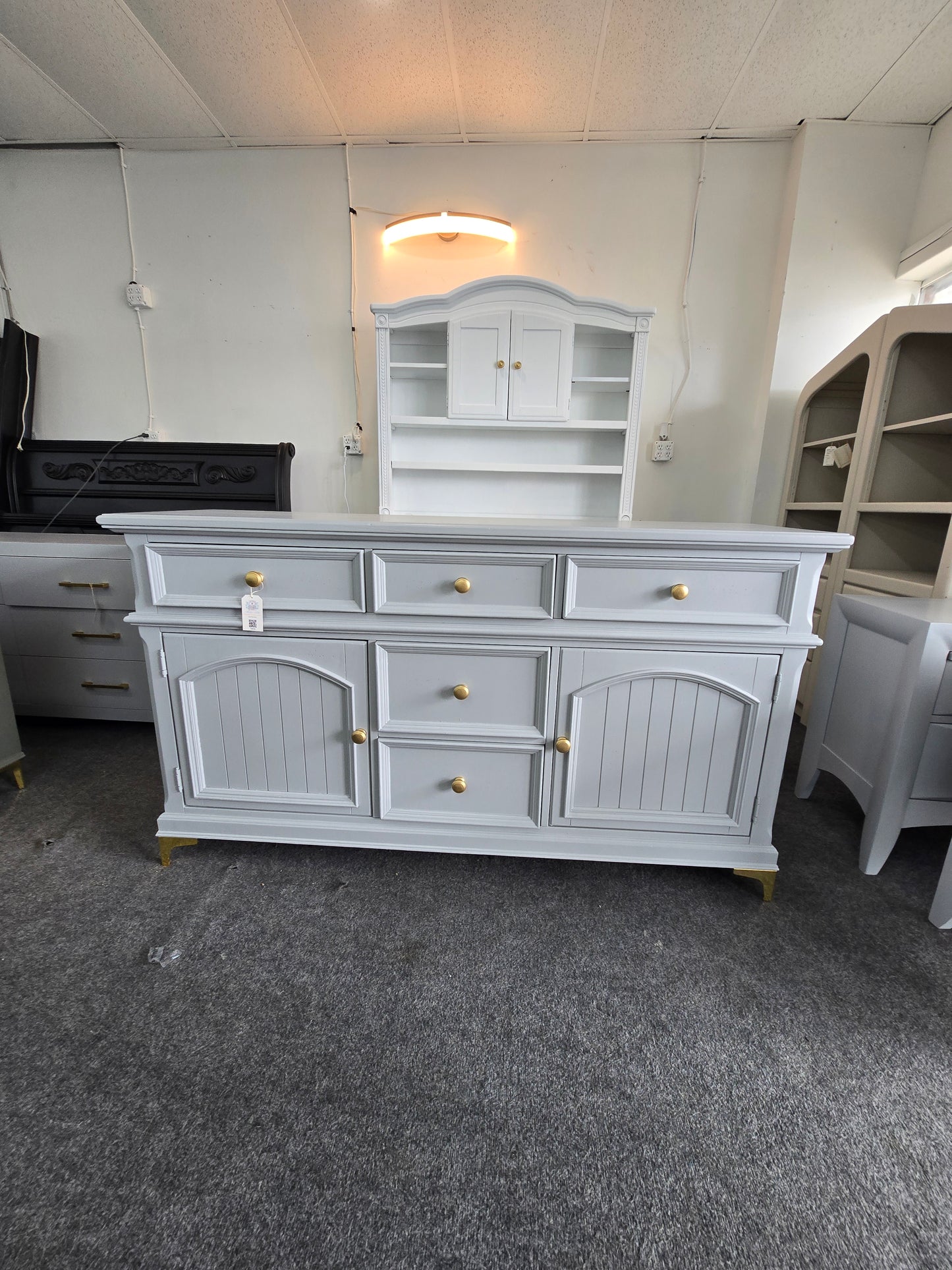 Gray dresser with golden legs