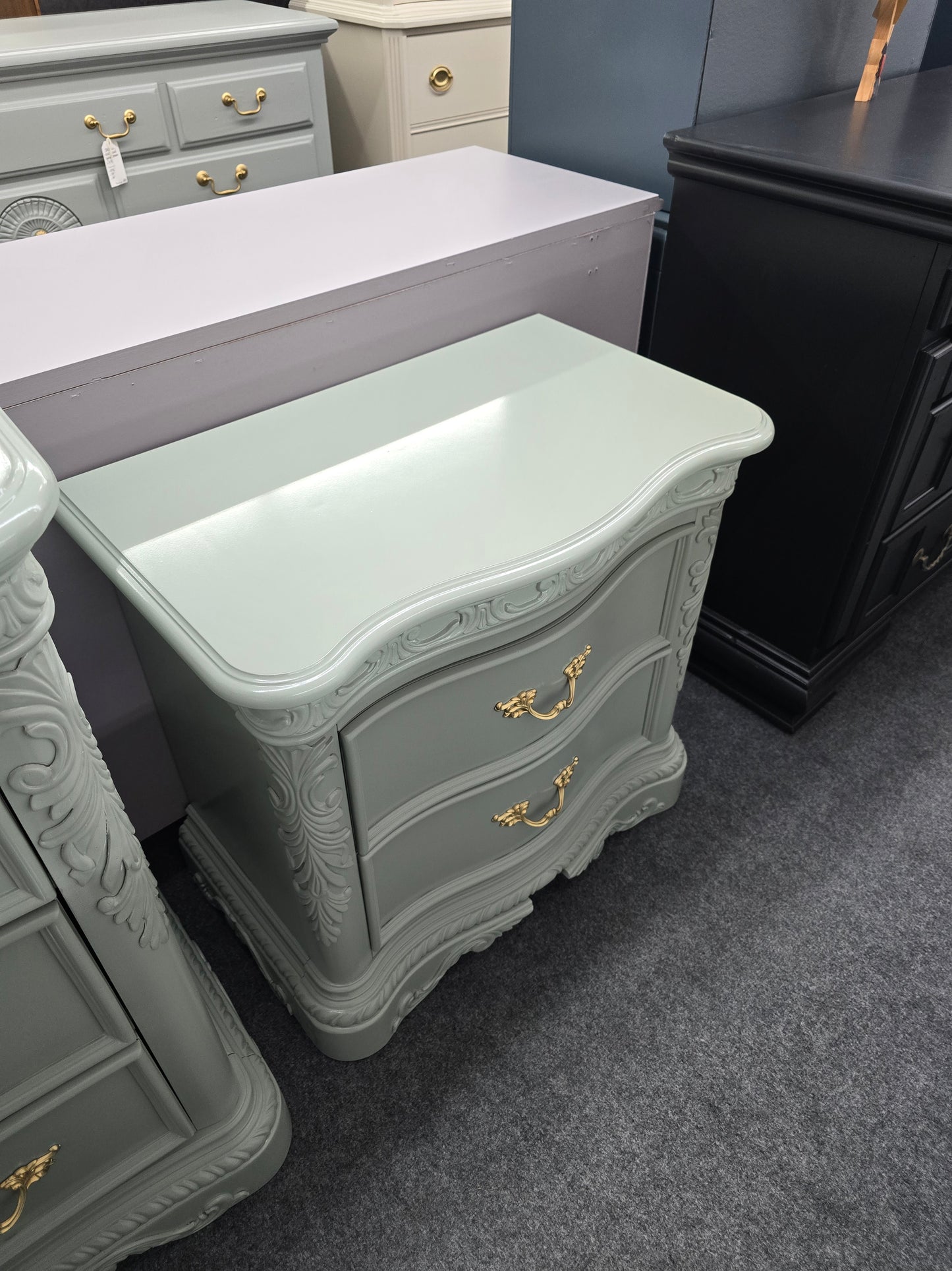 Green carved lacquered nightstand