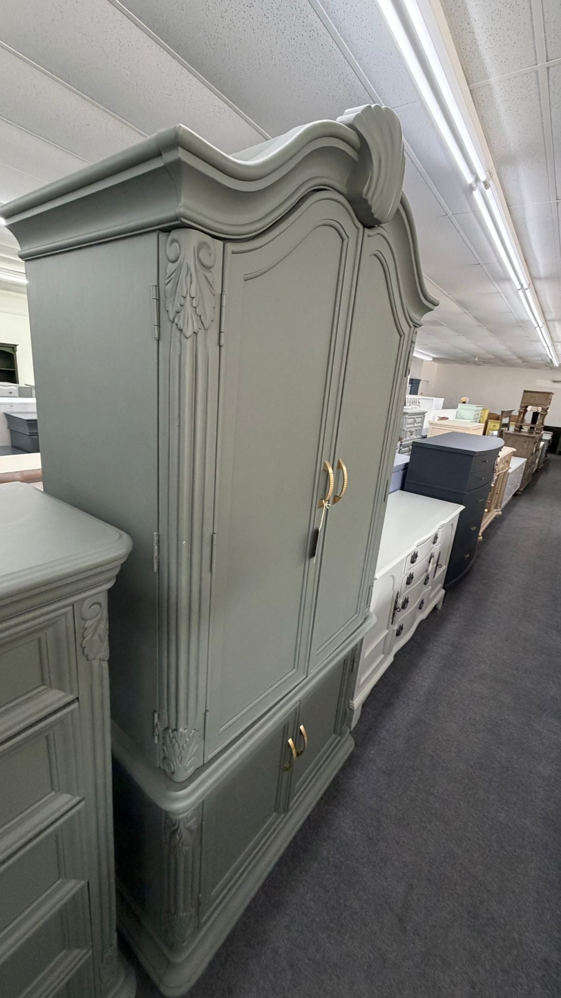 Pewter green carved armoire