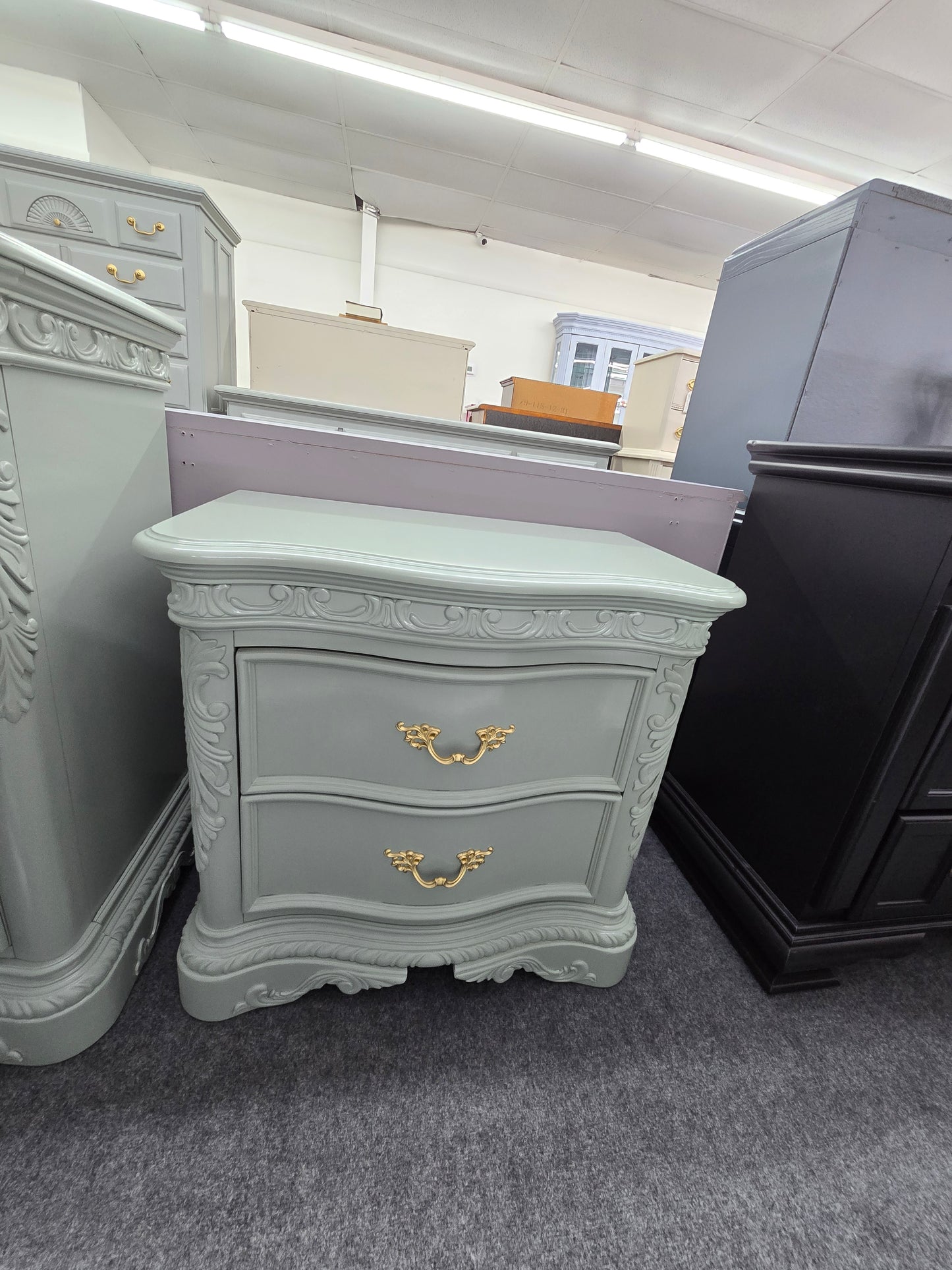 Green carved lacquered nightstand
