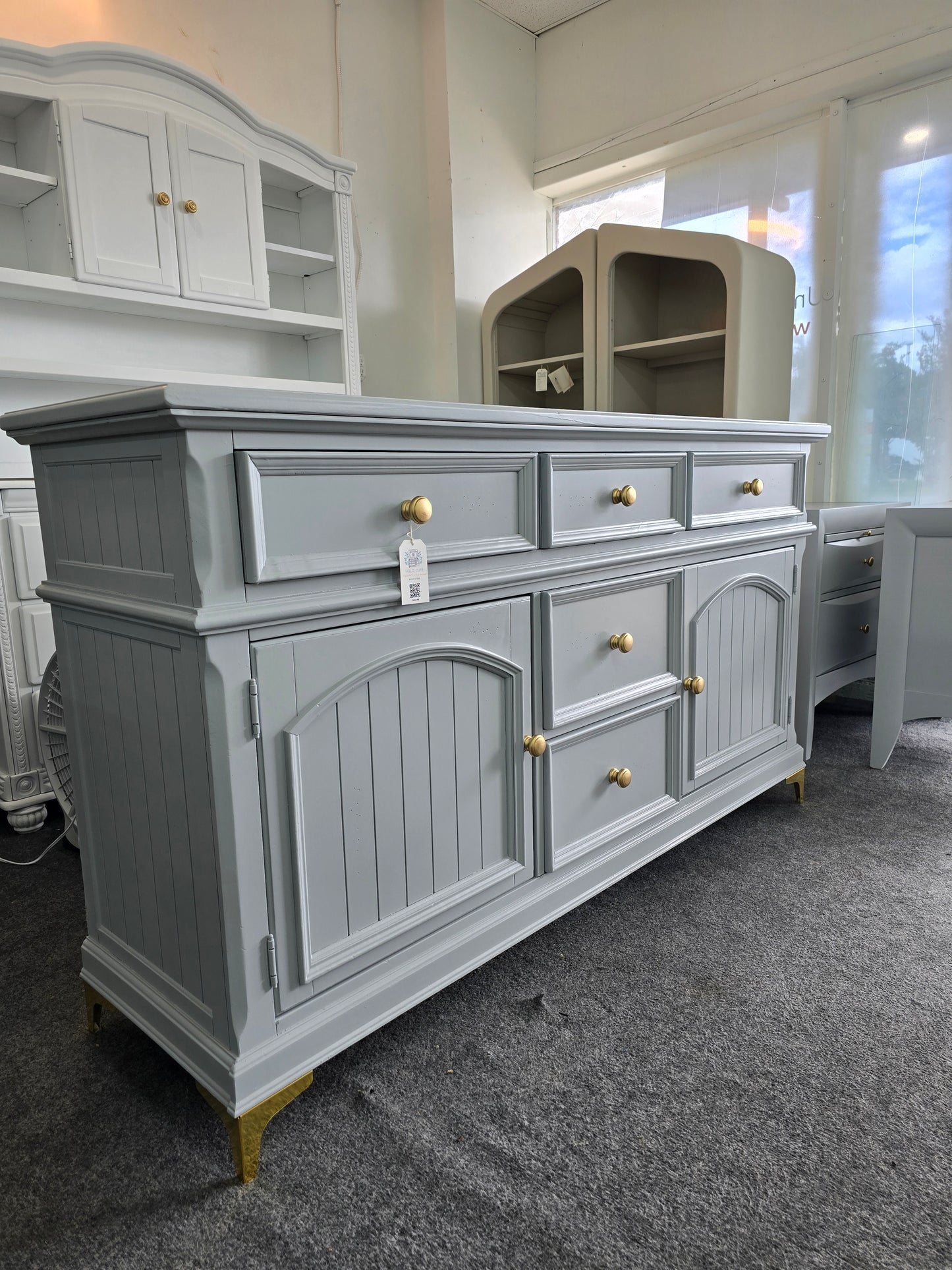 Gray dresser with golden legs