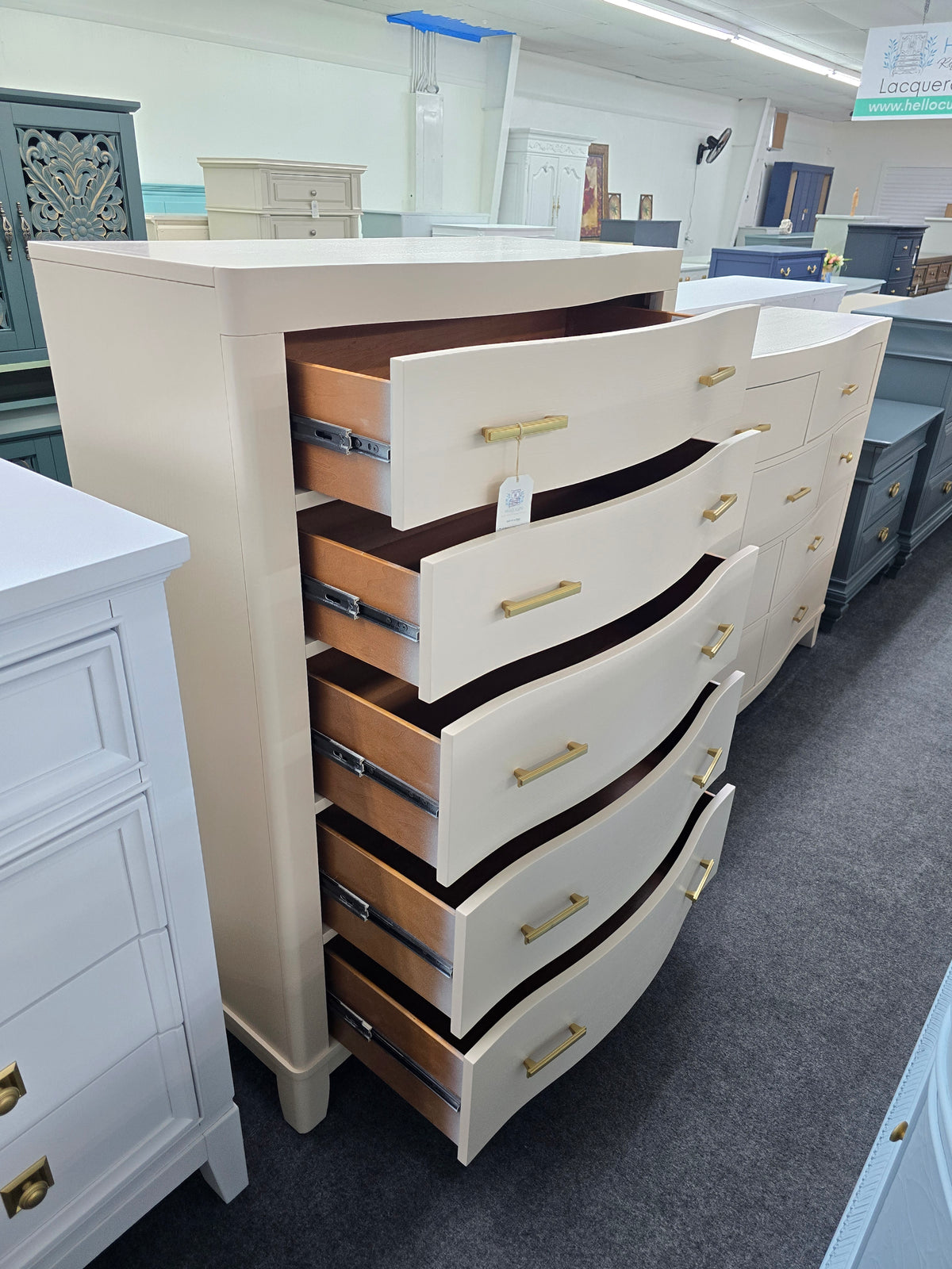 Cream lacquered bowfront chest
