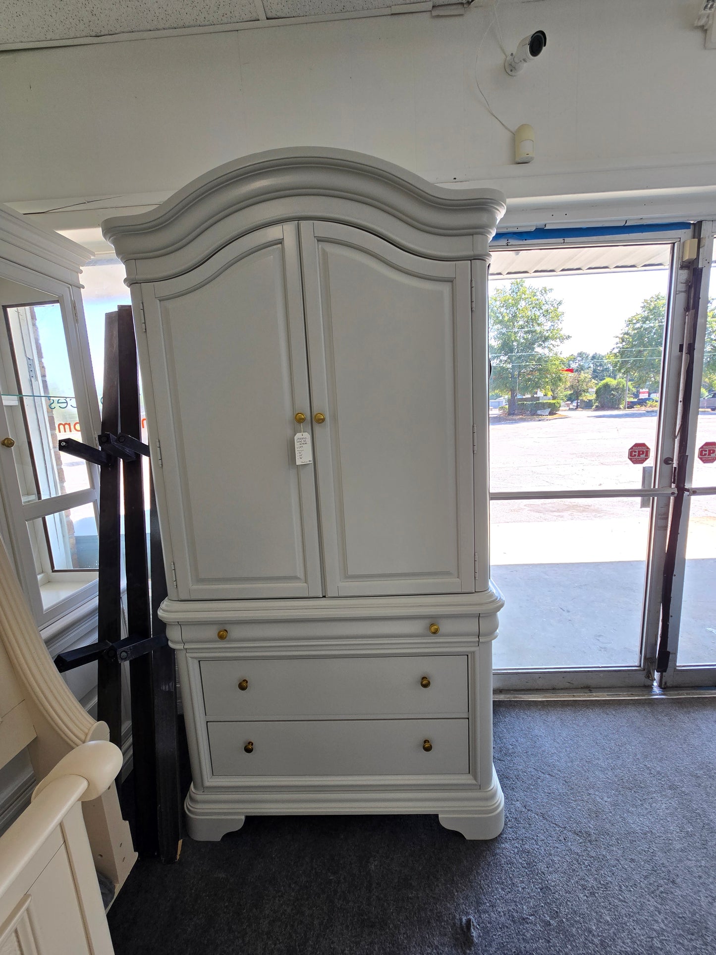 Gray tall armoire
