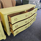Soft yellow bowfront modern dresser