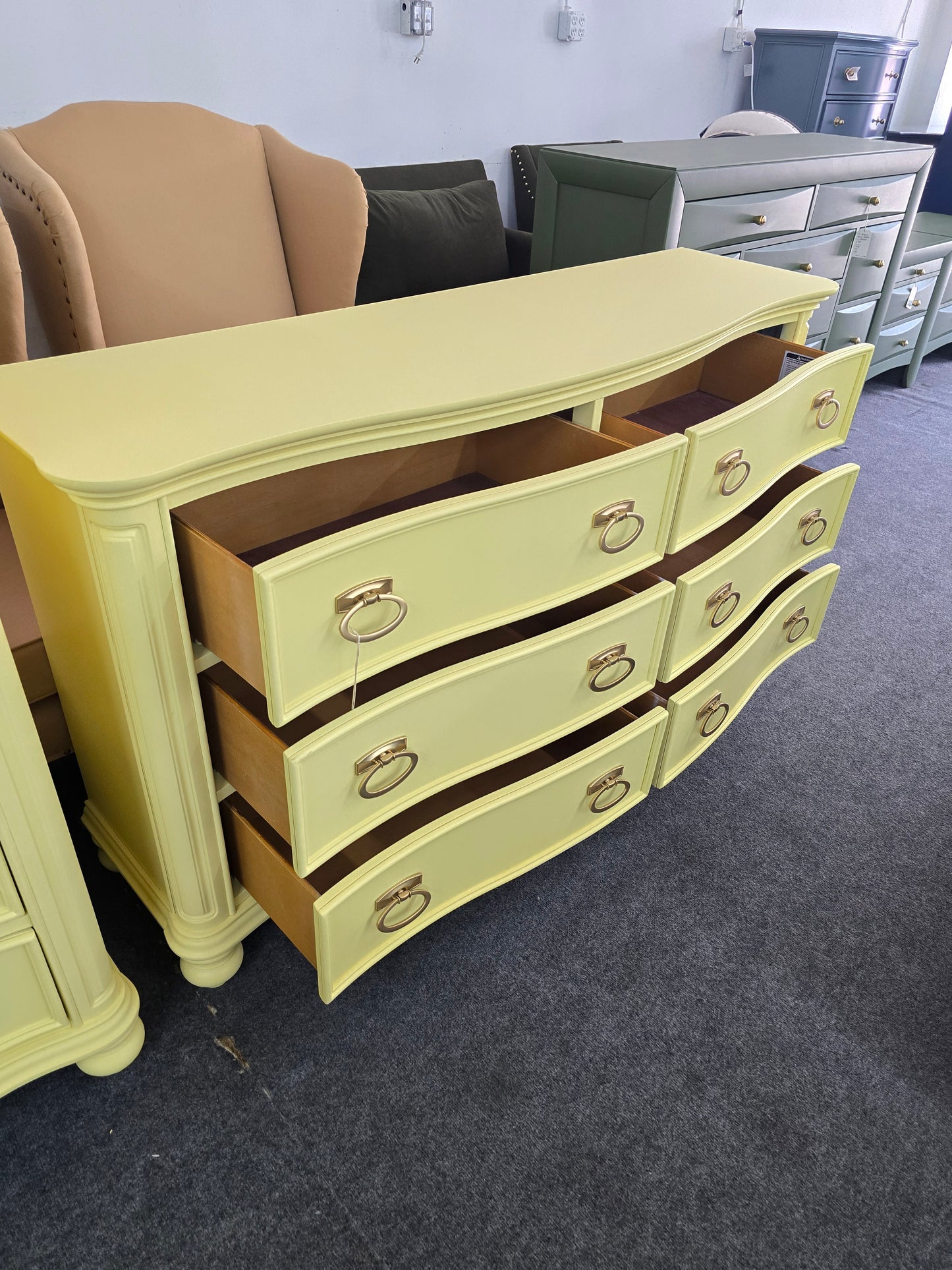 Soft yellow bowfront modern dresser