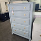 Teal chest with hexagonal knobs