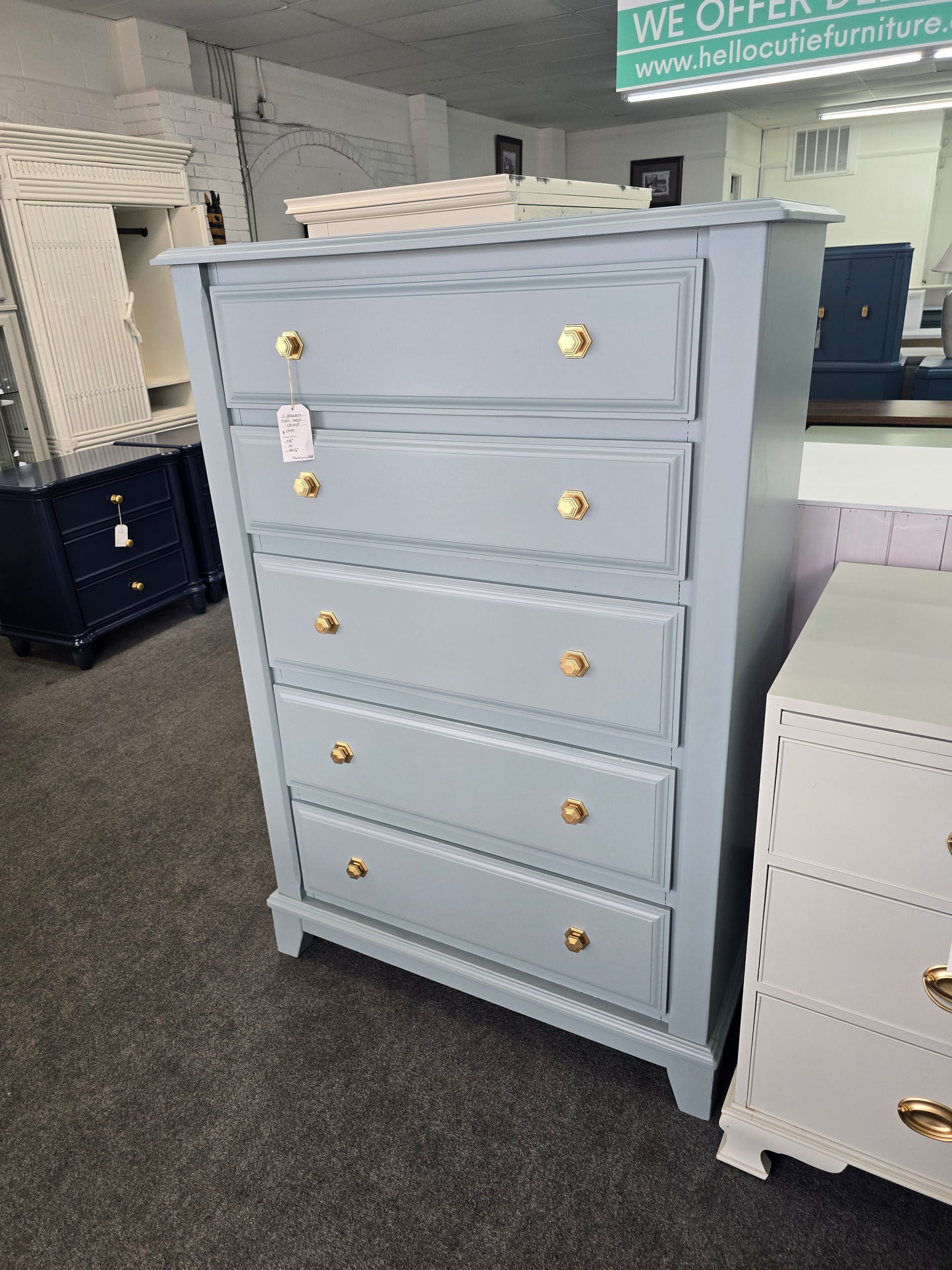 Teal chest with hexagonal knobs