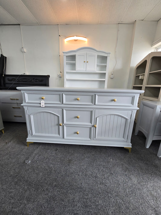 Gray dresser with golden legs