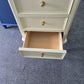 Pale yellow lacquered lingerie chest