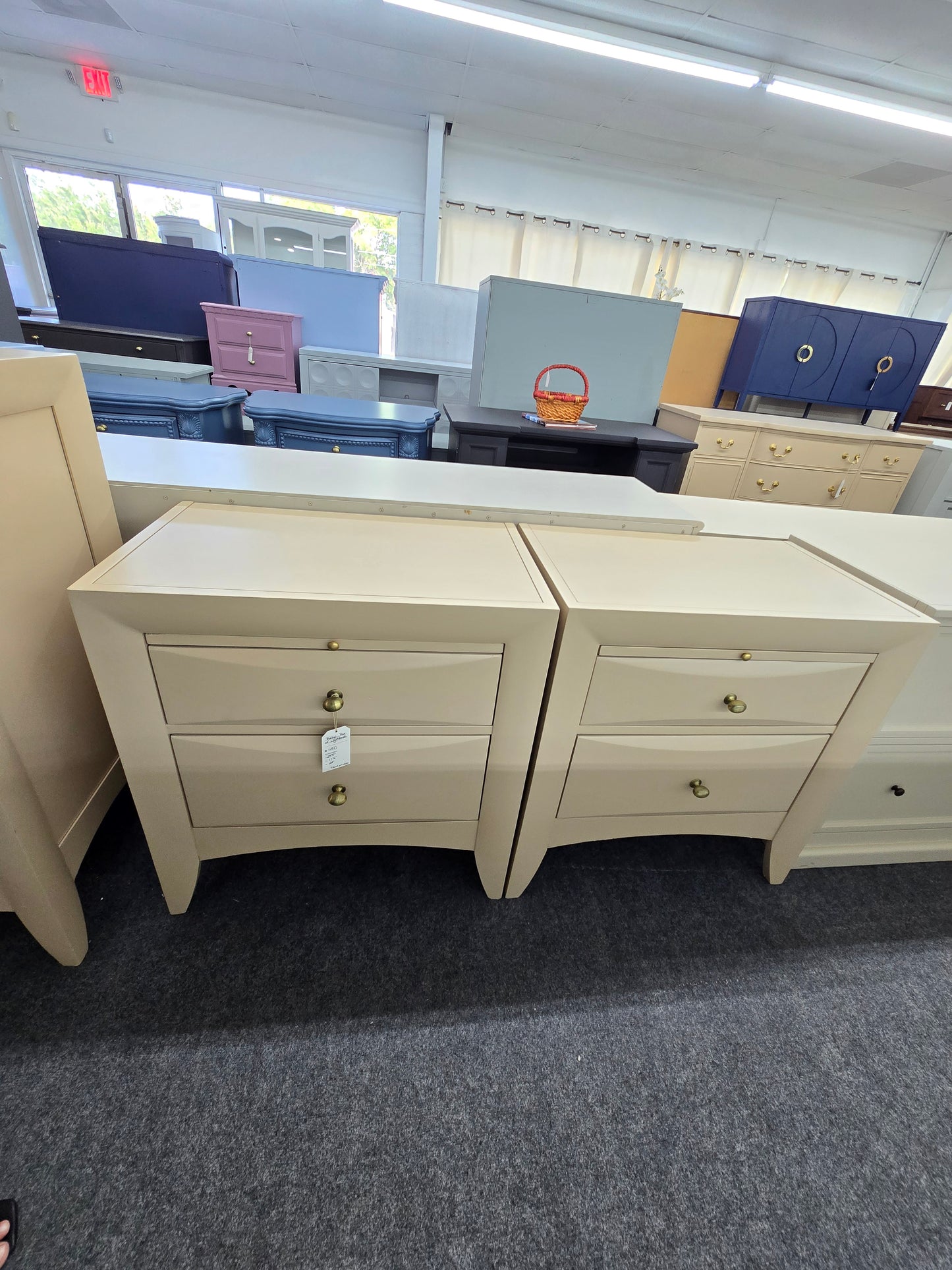 Beige pair of nightstands