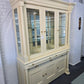 Bassett pale yellow lacquered china cabinet