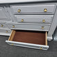 Beautiful gray dresser 6 drawers 1 door rattan drawers
