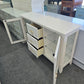 Pale pink TV stand
