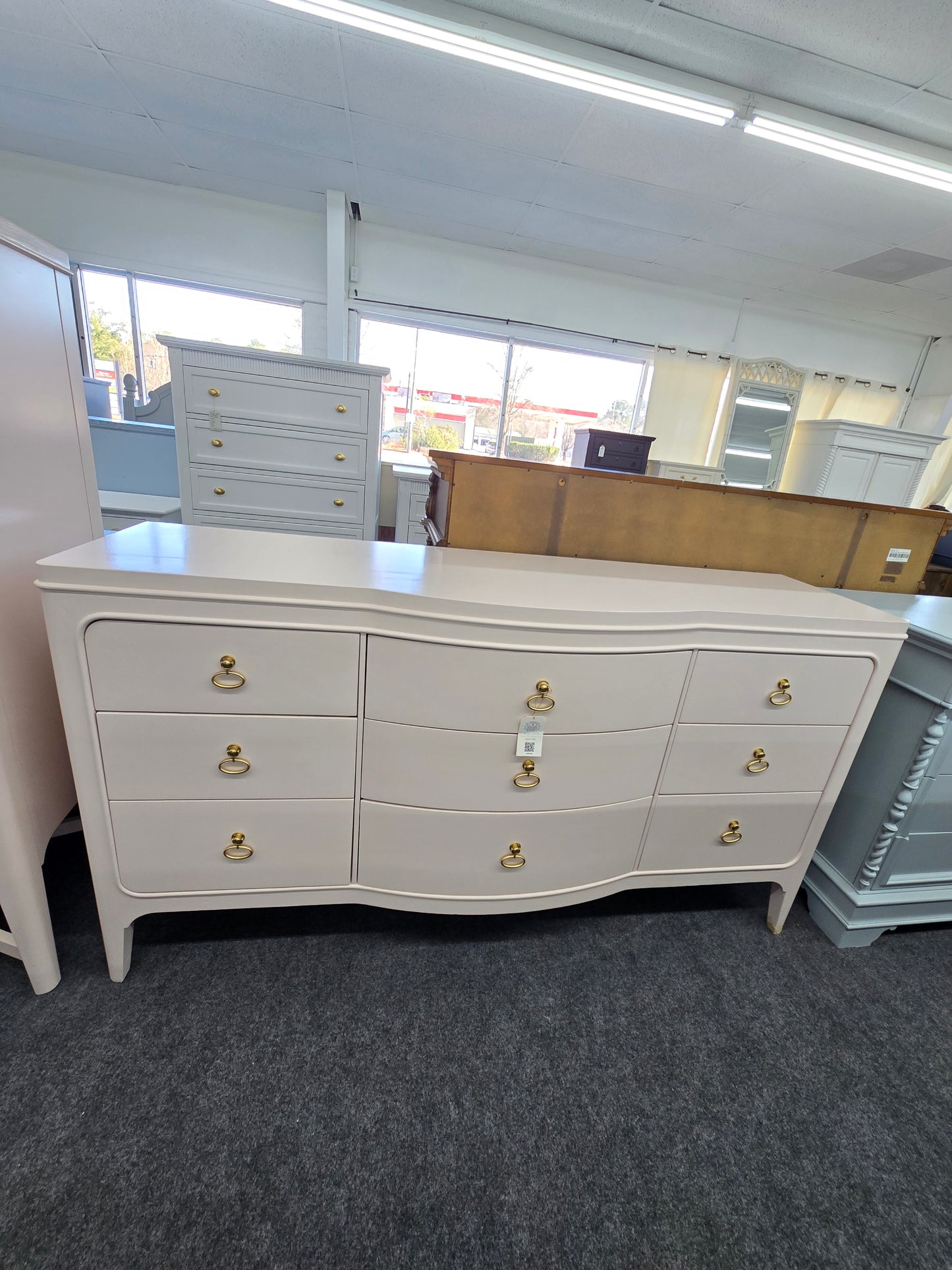 Universal soft pink lacquered dresser