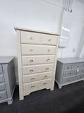Beige tall chest of drawers