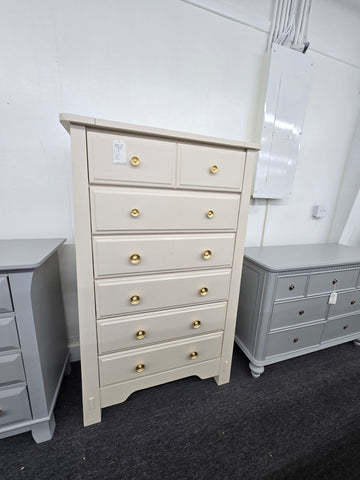 Beige tall chest of drawers