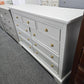Light gray hexagon knobs dresser