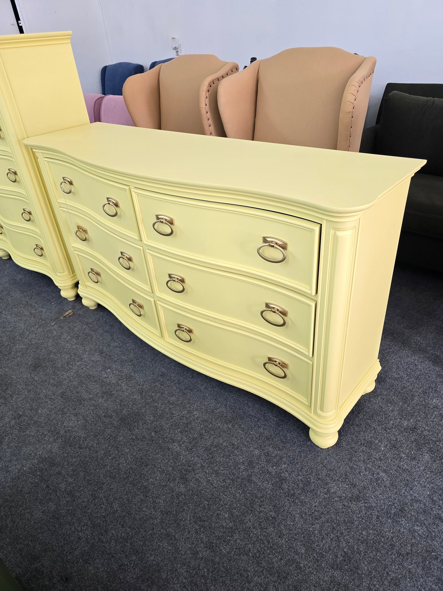 Soft yellow bowfront modern dresser