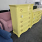 Bowfront yellow modern chest