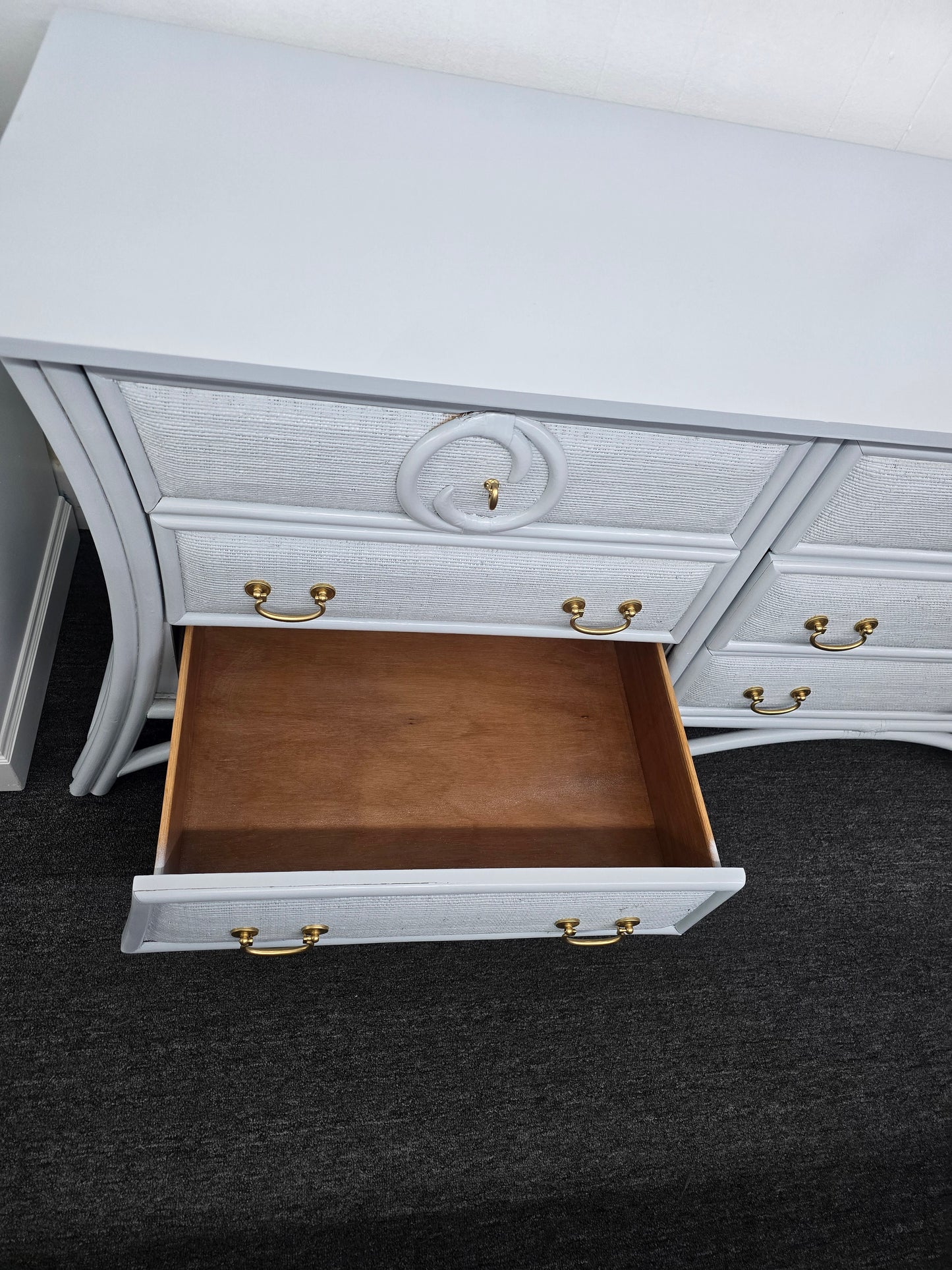 Light blue rattan dresser