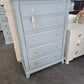 Teal chest with hexagonal knobs