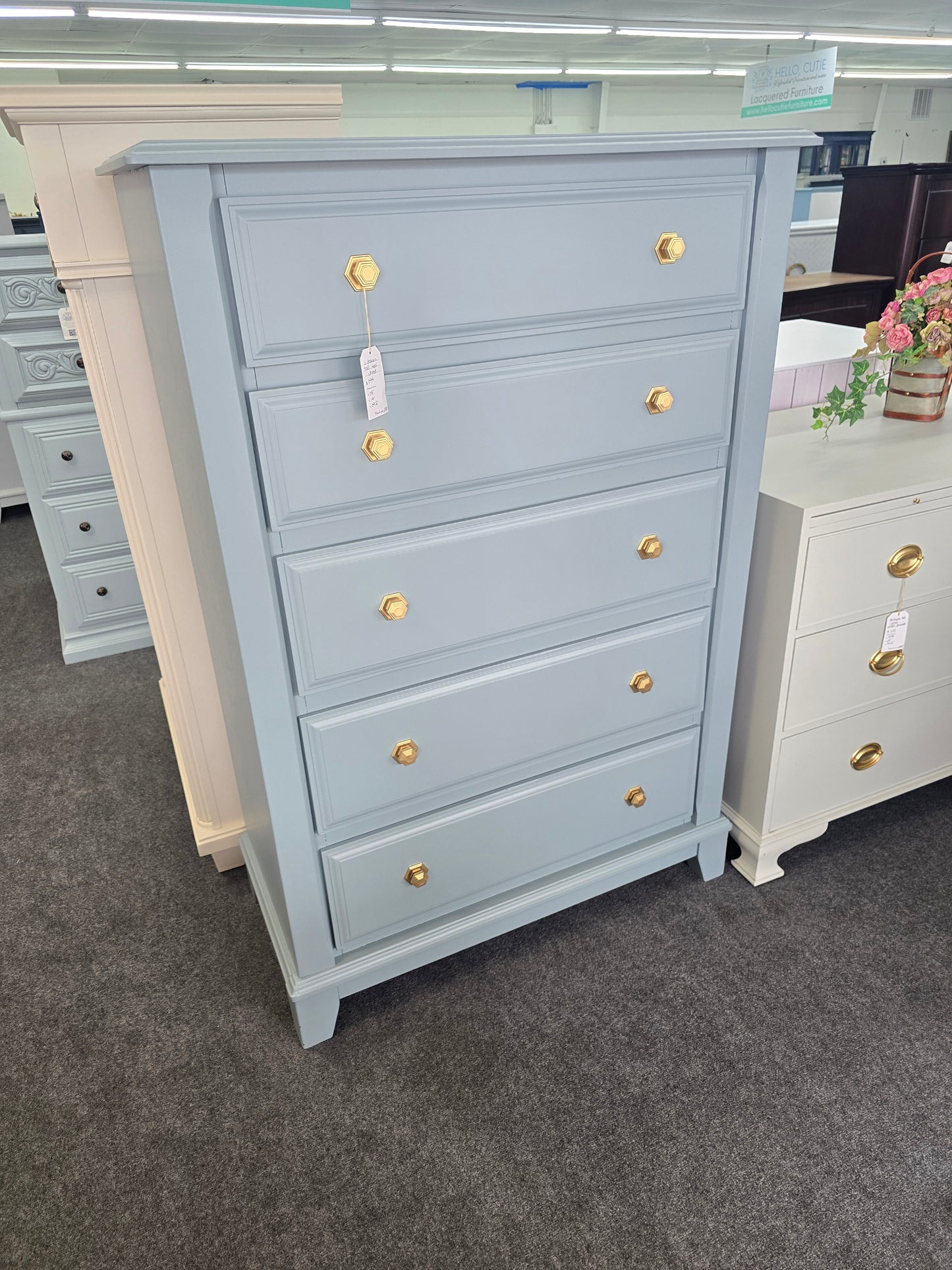 Teal chest with hexagonal knobs