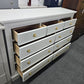 Light gray hexagon knobs dresser