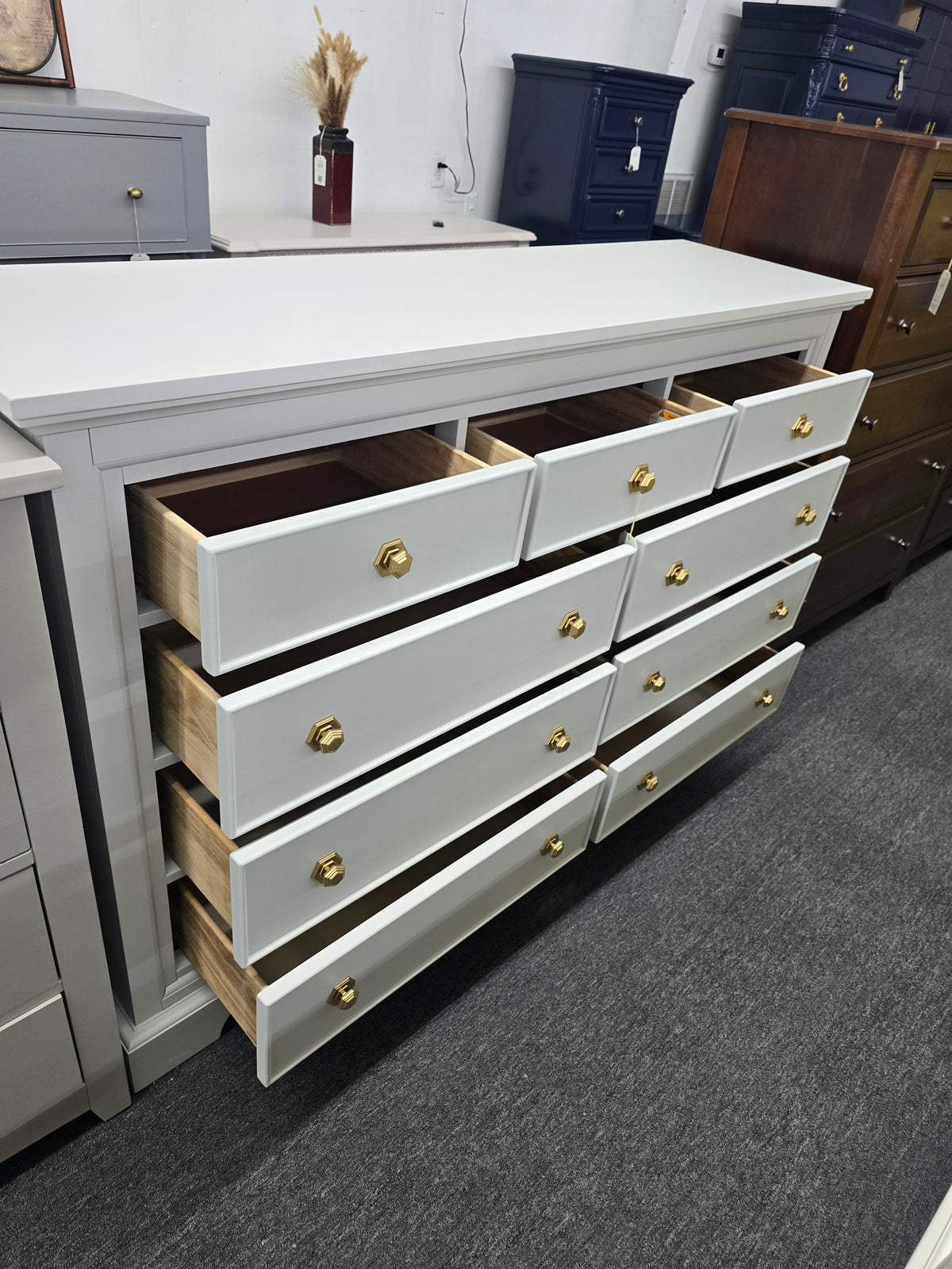 Light gray hexagon knobs dresser