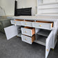 Gray dresser with golden legs
