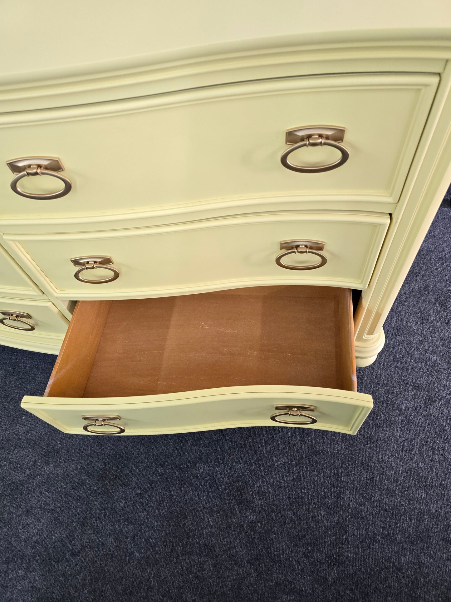 Soft yellow bowfront modern dresser