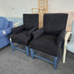 2 upholstered black chairs