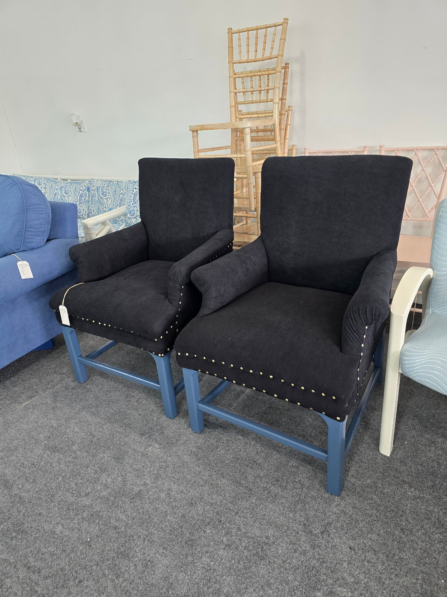 2 upholstered black chairs