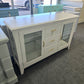 Pale pink TV stand