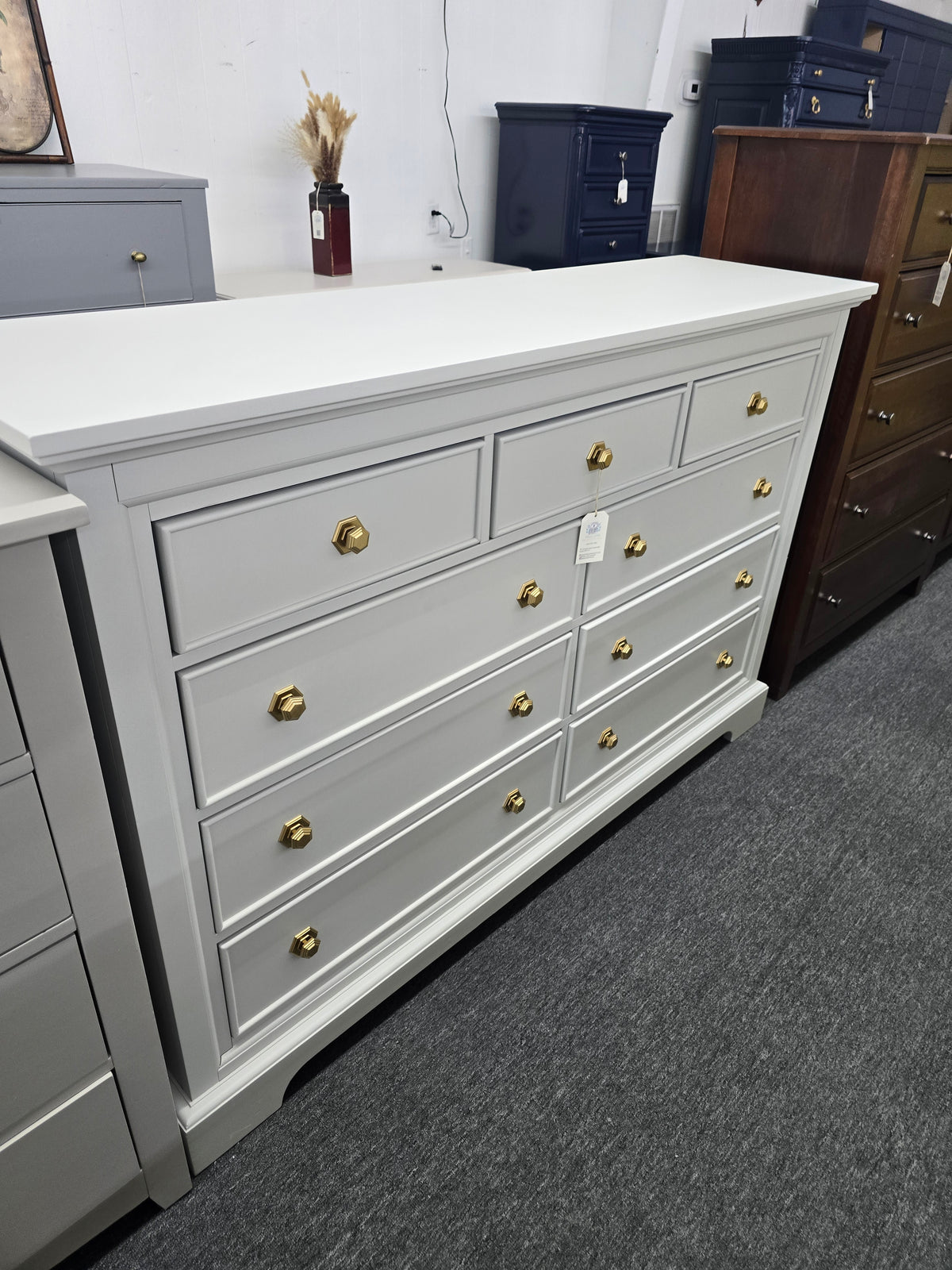 Light gray hexagon knobs dresser
