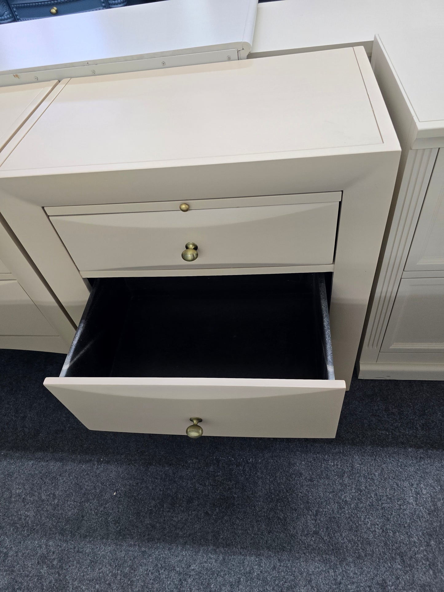 Beige pair of nightstands