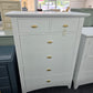 Kathy Ireland tall white chest