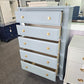 Teal chest with hexagonal knobs