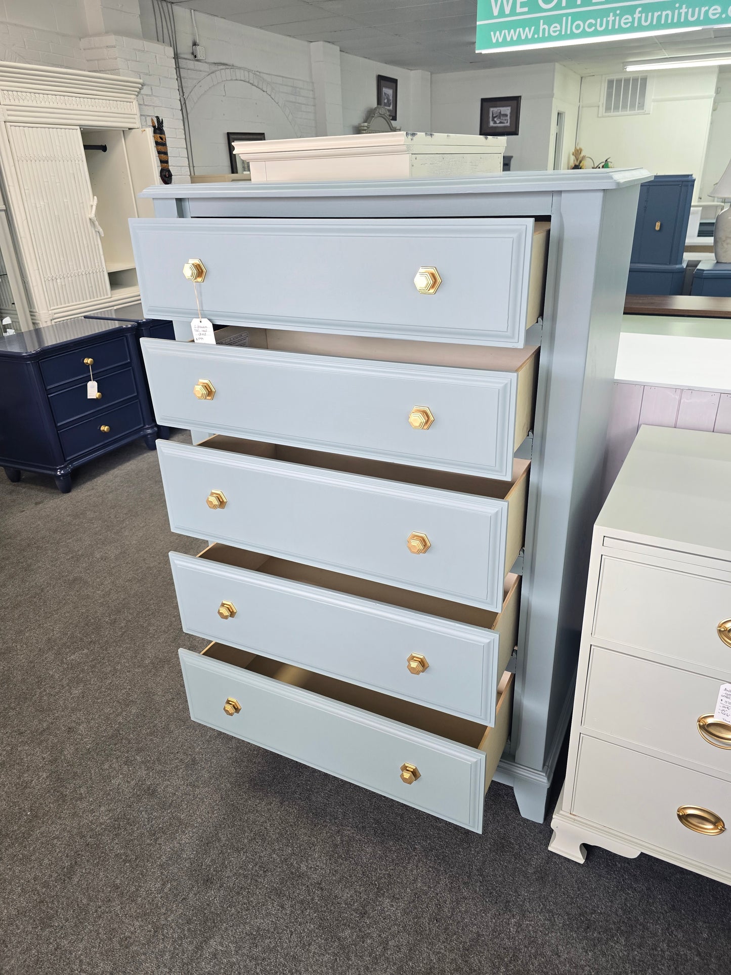 Teal chest with hexagonal knobs