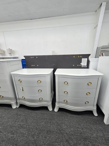 Pair of curved light gray nightstands