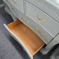 Green carved lacquered dresser