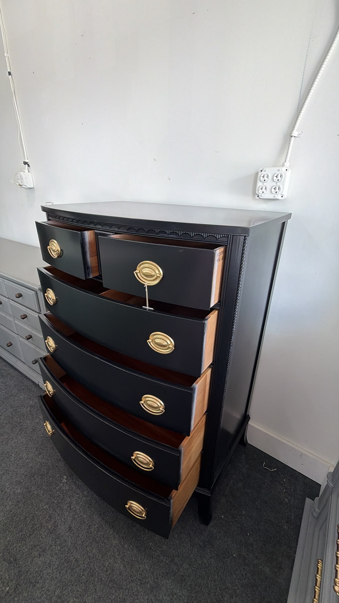Solid wood bowfront black lacquered chest