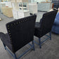 2 upholstered black chairs