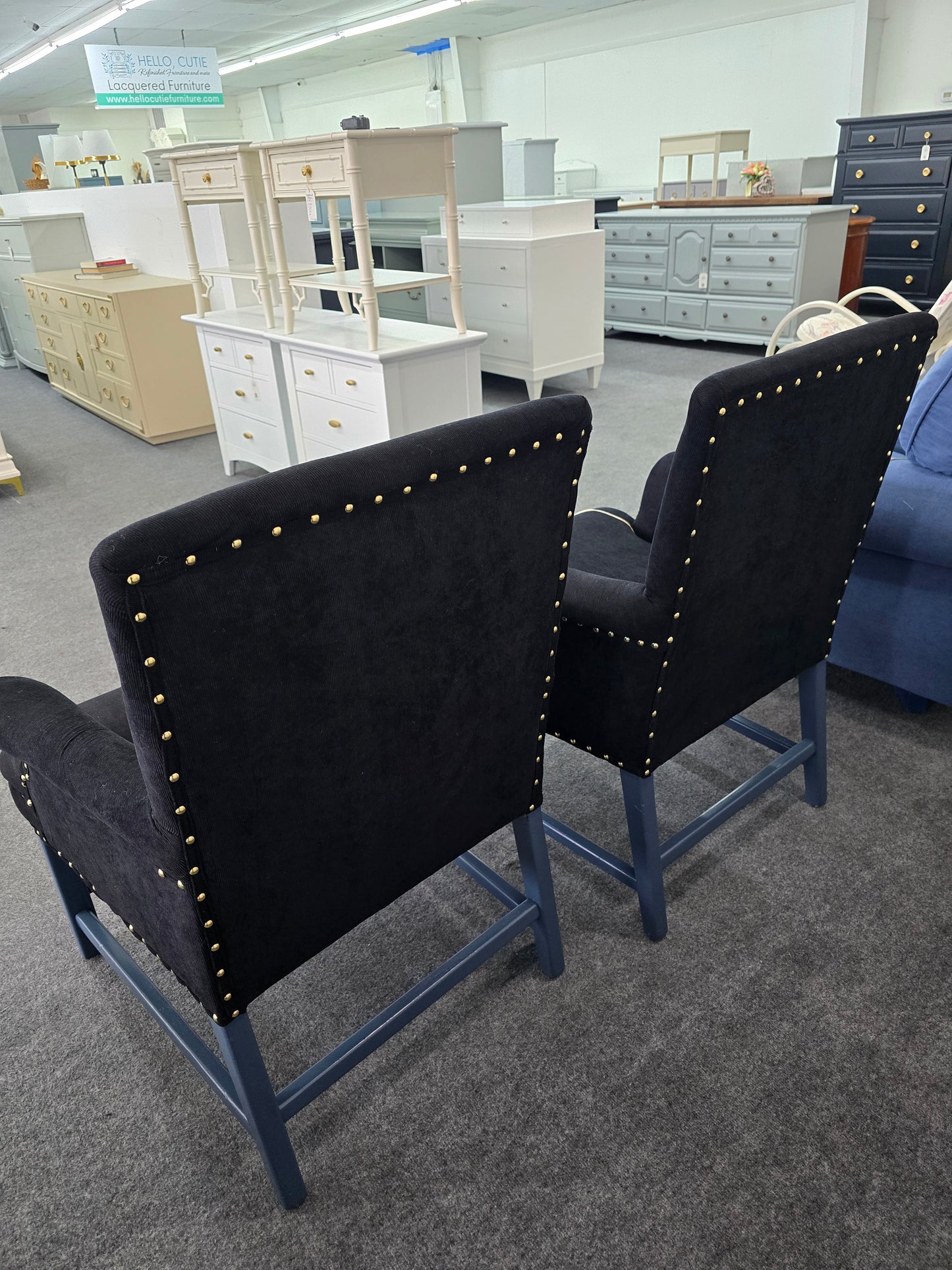 2 upholstered black chairs