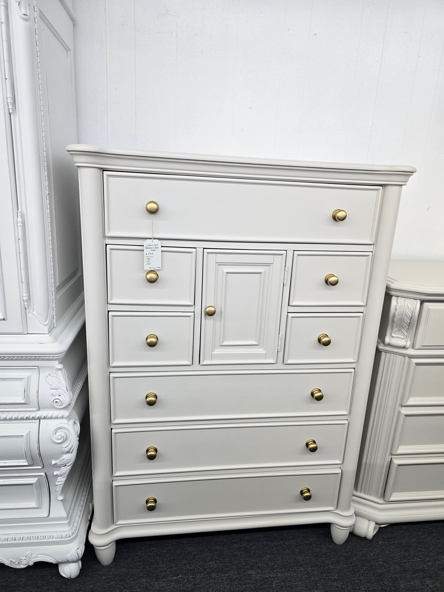 Cream tall 8 drawers 1 door chest