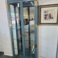 Green lacquered glass cabinet