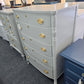 Gray solid wood bowfront chest