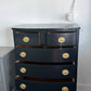 Solid wood bowfront black lacquered chest