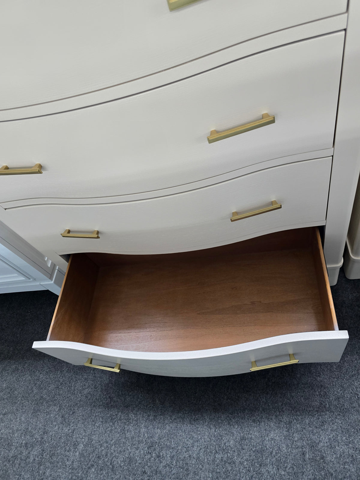 Cream lacquered bowfront chest