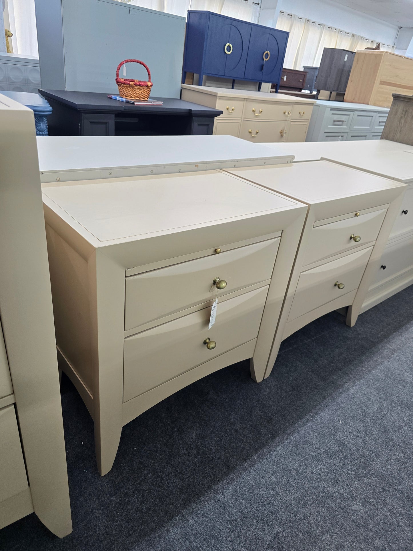 Beige pair of nightstands
